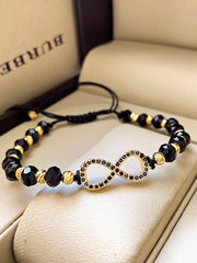 Bratara onix fatetat pe patrat si inox aurit, model infinit