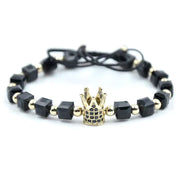 Bratara din onix si inox aurit, model coroana cu zirconii negre si margele patrate mari